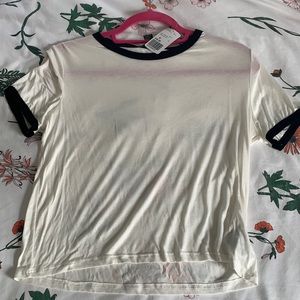 Cream colored t shirt with black detailing NWT
